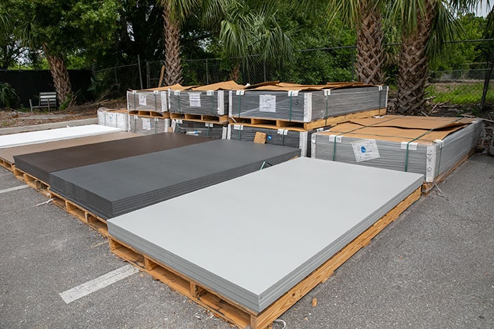 Marine-grade poly lumber sheets ready for cutting