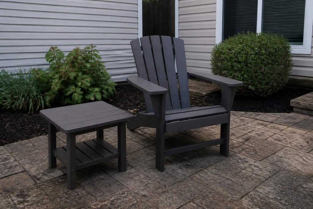 Outdoor furniture on uneven paver patio